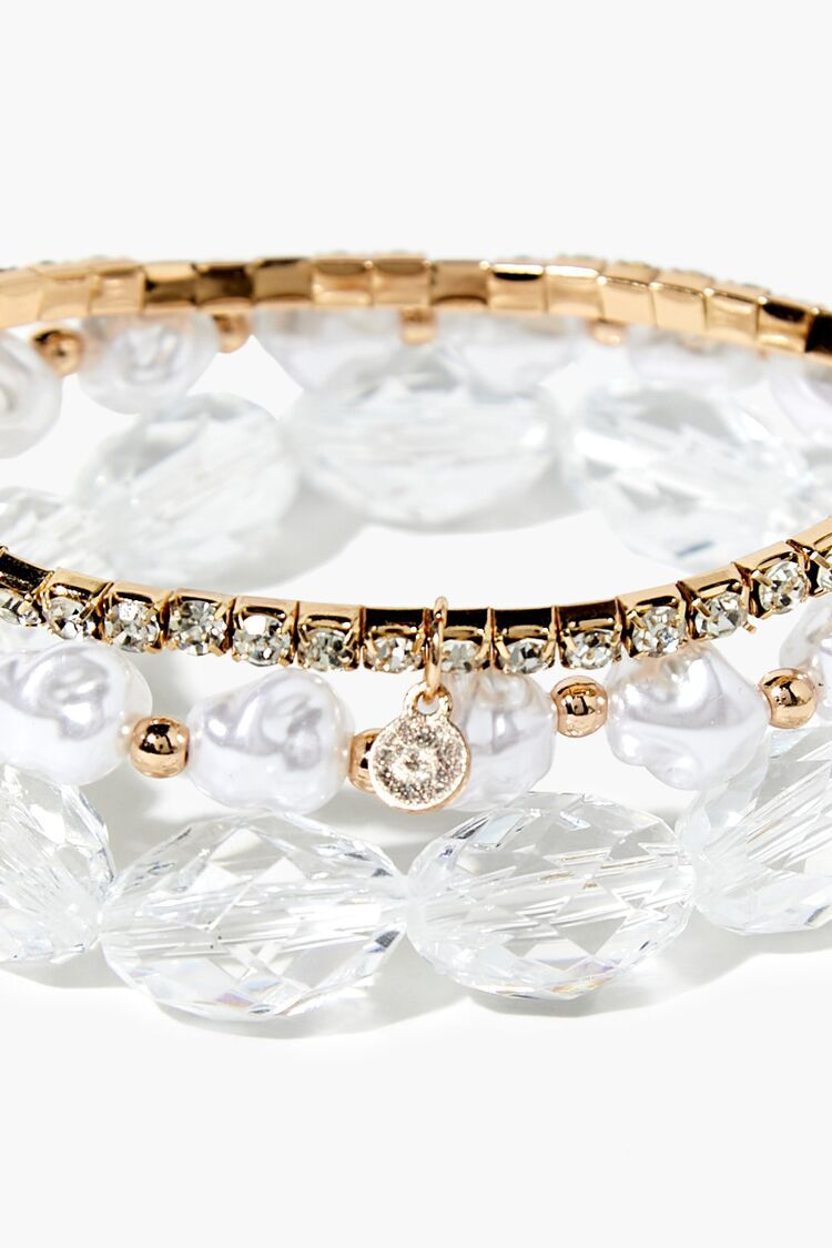 Set Pulseras Dorado/Blanco